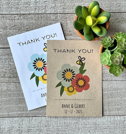 A brown and white seed packet with blue, yellow and red flowers and the words Thank You.