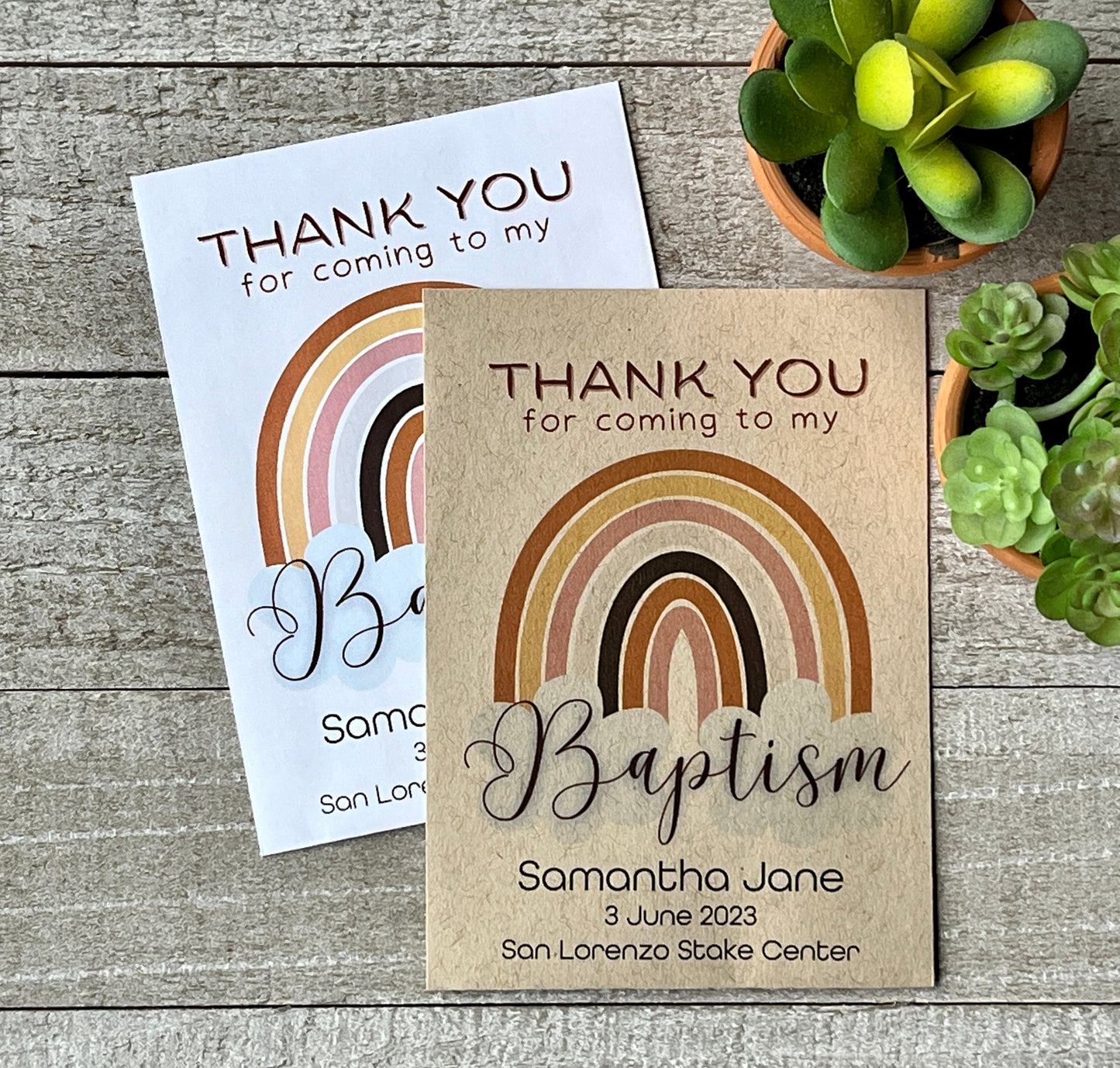 A white and brown seed packet with a rainbow and the words, thank you for coming to my baptism.