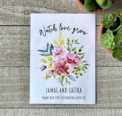A white seed packet with pink and yellow flowers and the phrase, watch love grow.