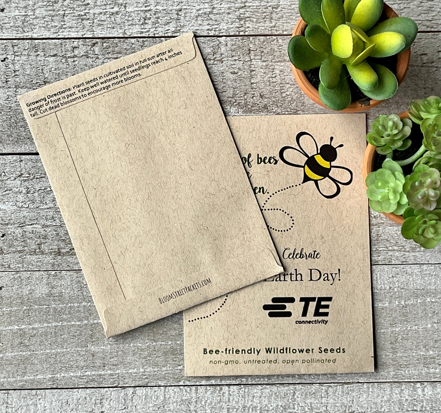 A front and back view of a brown seed packet, the back view showing planting instructions.