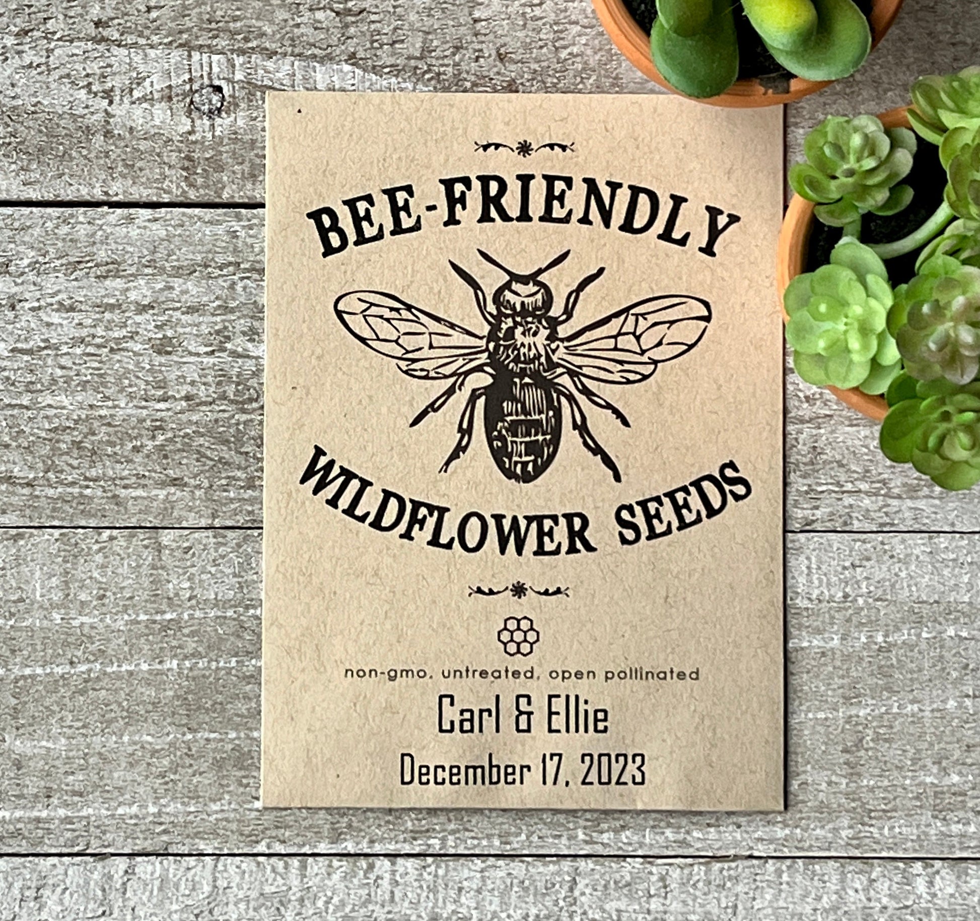 A brown seed packet that has a large line drawing of a bee and the words "bee-Friendly."