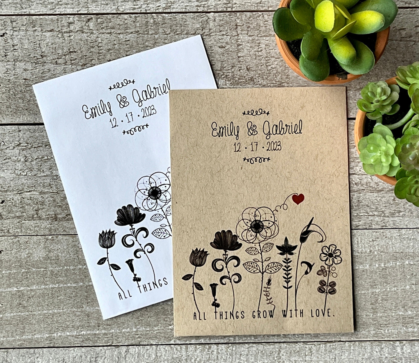 a white and brown seed packet with black line drawn flowers and a red heart along the bottom edge.